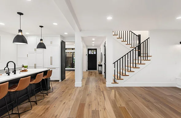 Spacious and elegant modern interior with stylish furniture and lighting, showcasing high-quality interior design and renovation services.