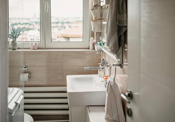 Bathroom with bathtub and window, highlighting shower replacement contractor services in Bethesda, MD.
