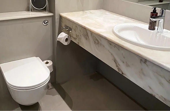 Modern bathroom with sink and shower in Silver Spring, MD, showcasing small bathroom renovation services.